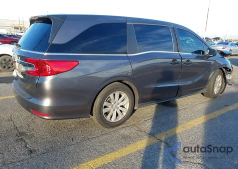 2018 Honda Odyssey Lx z USA, uszkodzony, nr VIN 5FNRL6H29JB101502